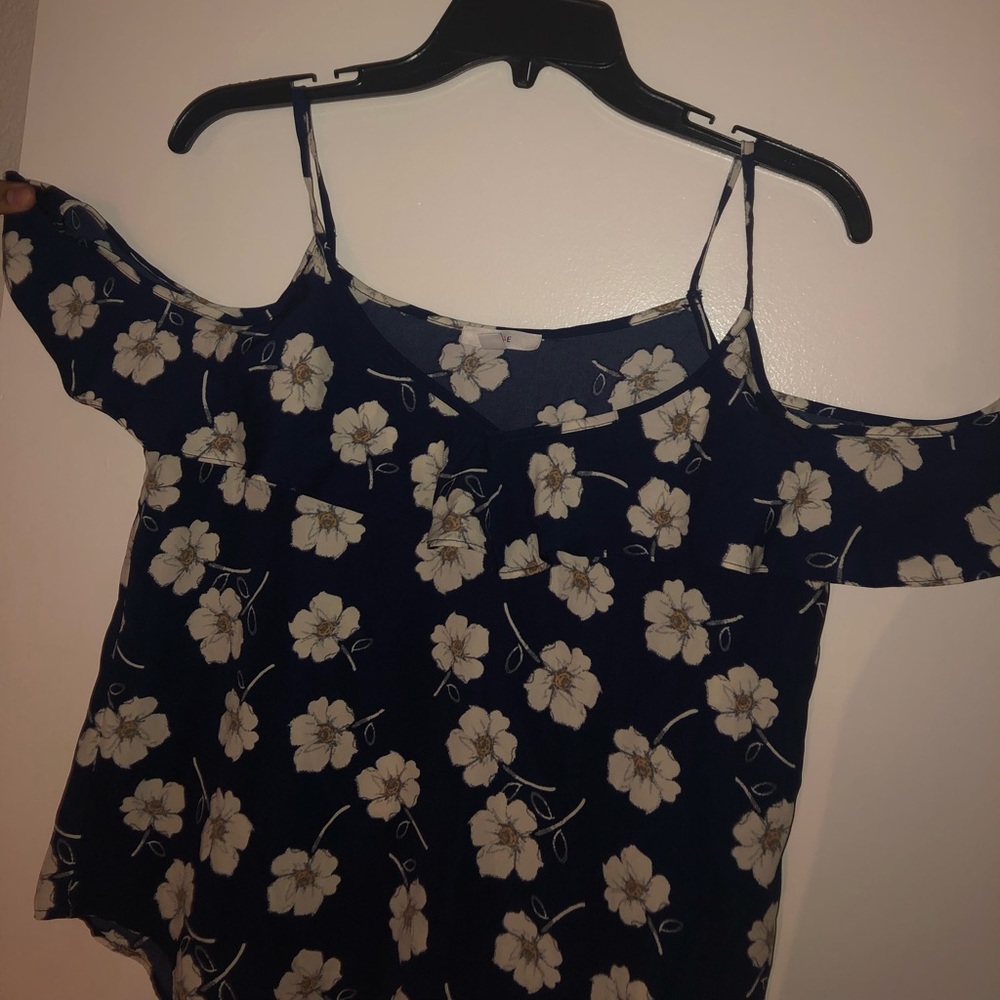 Off the shoulder flower printed blouse.